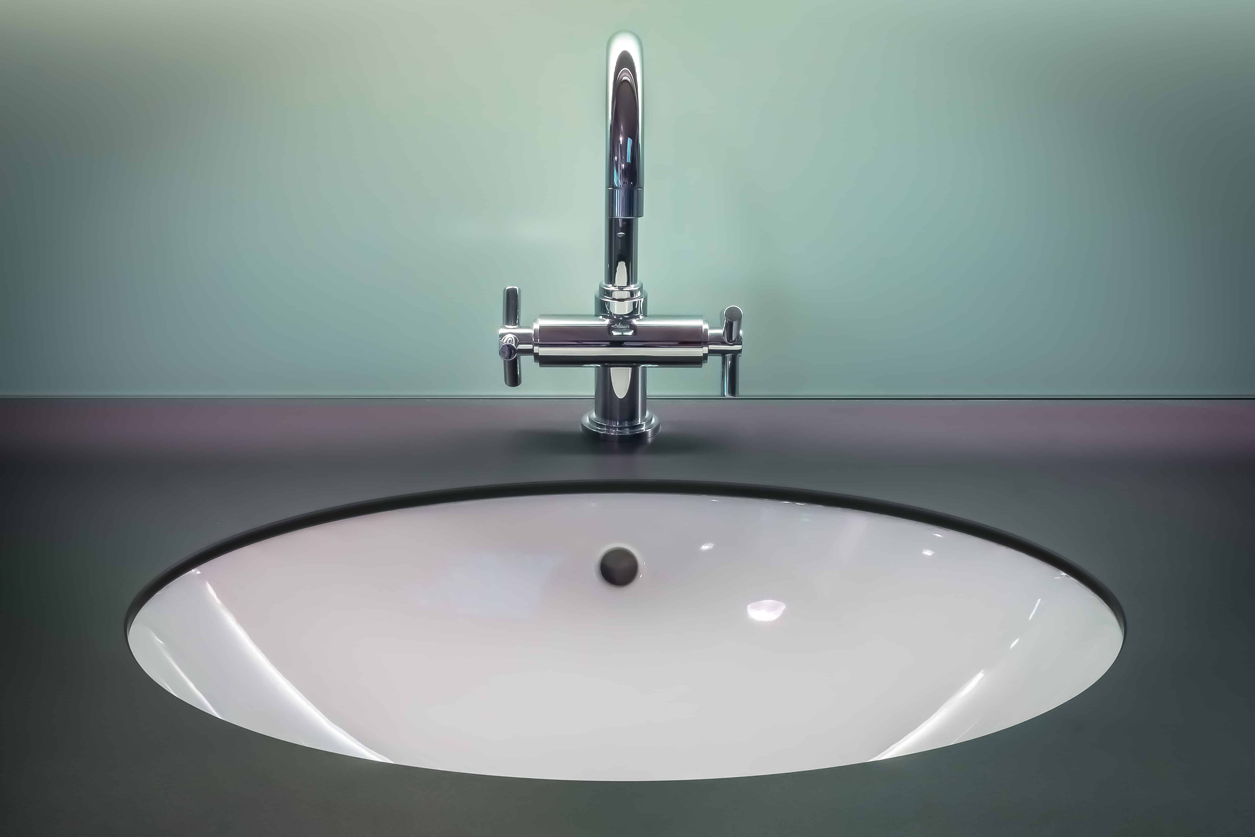 clean sink room lighting modern stainless steel bathtub bathroom indoors tap faucet bidet plumbing fixture vanity top Simphome com