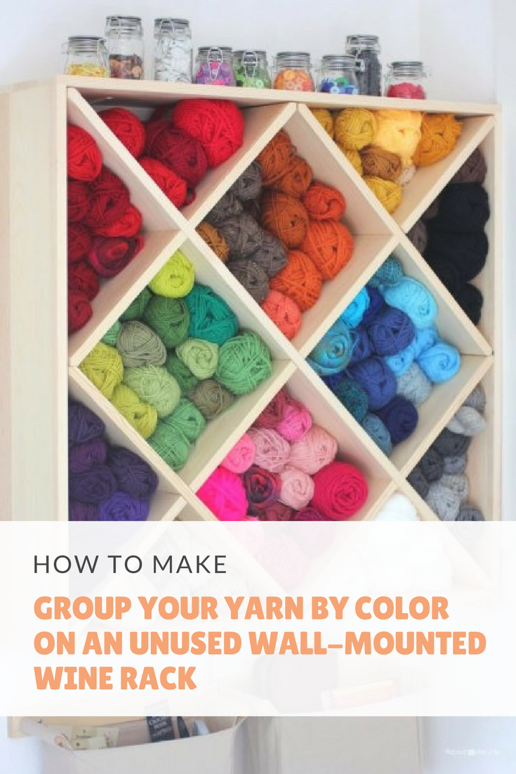 27 Group your yarn by color on an unused wall mounted wine rack via simphome