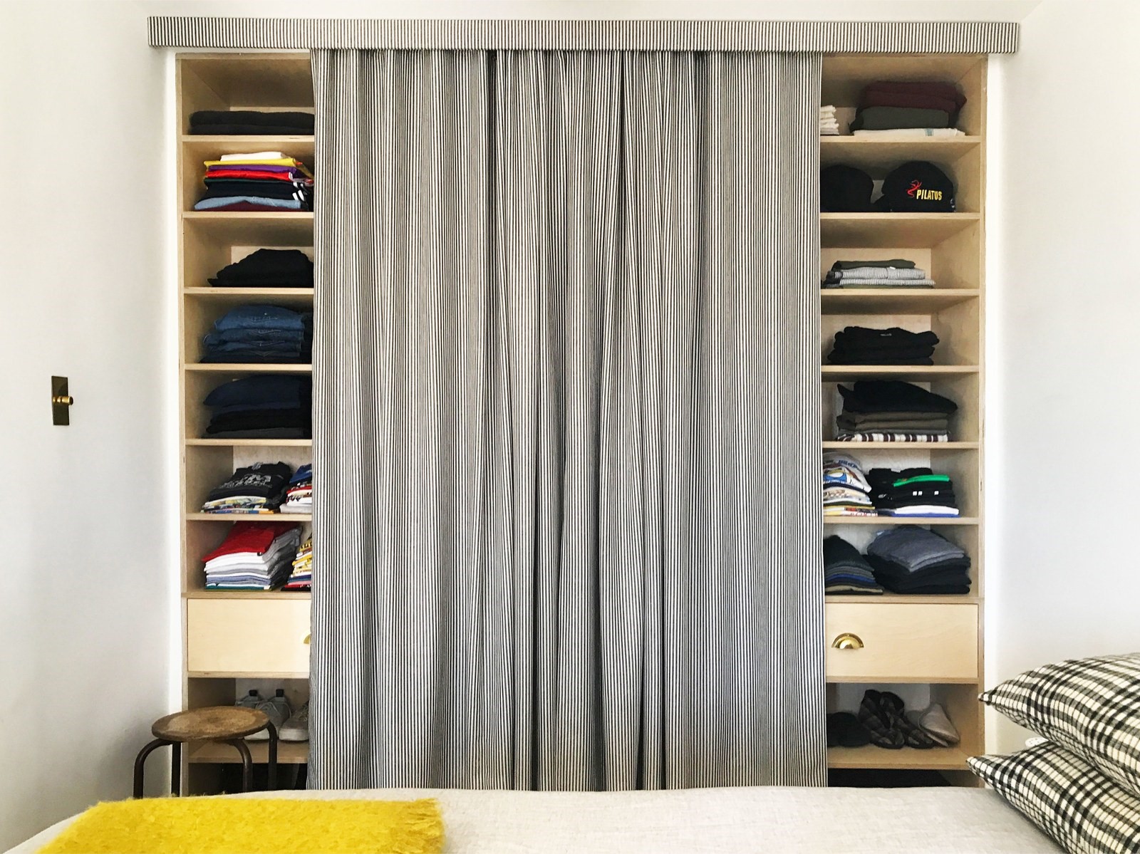 1.Cover Your Cabinets with Curtains via Simphome