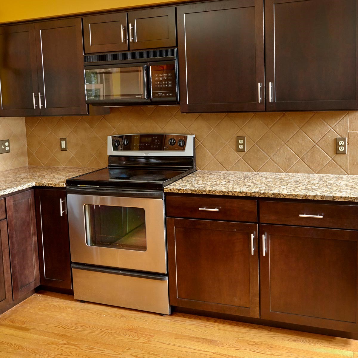 3. Refacing Kitchen Cabinets with Wood Veneer via Simphome.com