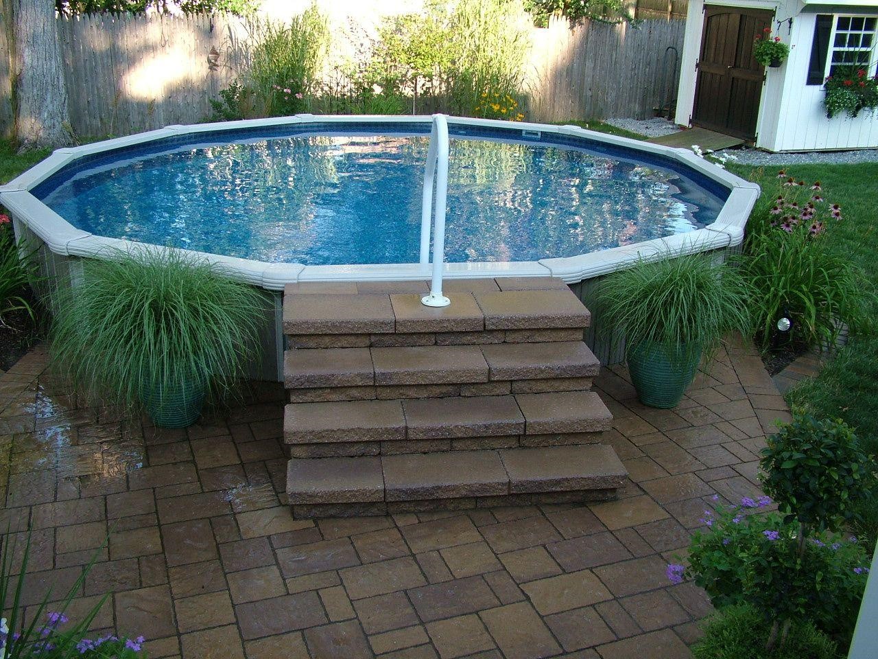 10.SIMPHOME.COM Small Round Above Ground Pool with Stepping Stones