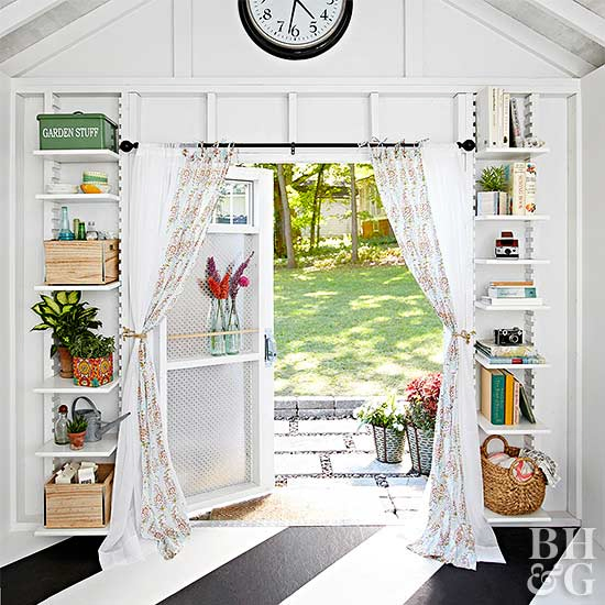 2. SIMPHOME.COM Stylish Garden Shed with Built In Bookshelves