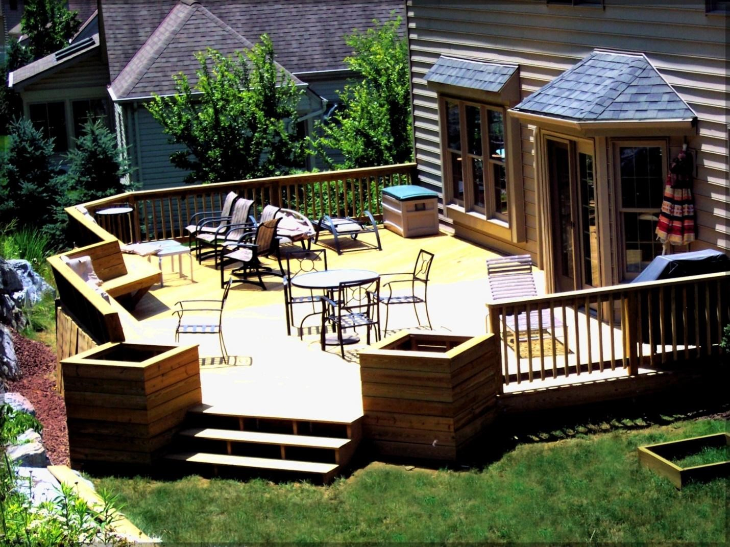 3.SIMPHOME.COM Backyard Patio with Wooden Deck