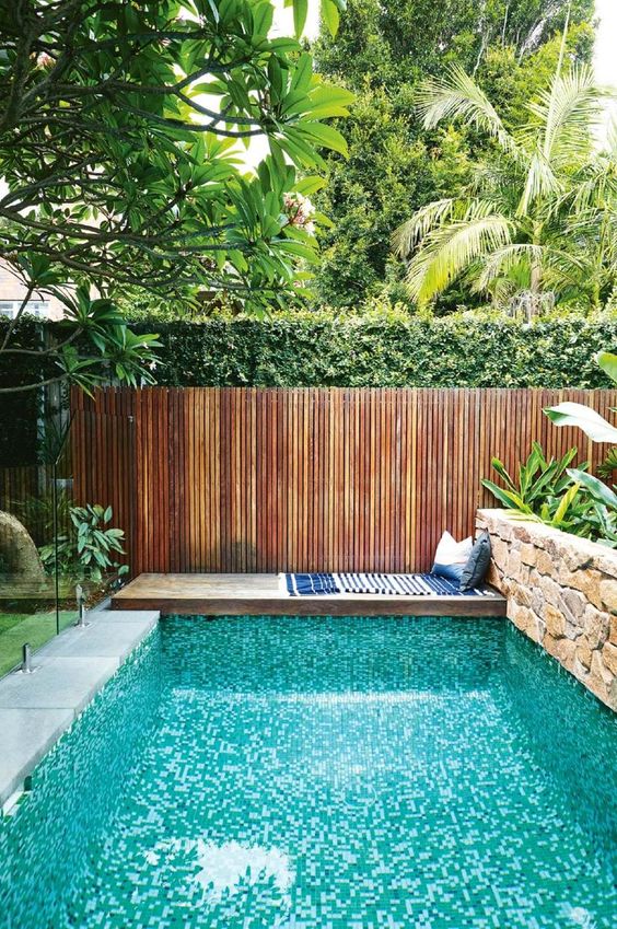 5.Above Ground Pool in Small Backyard with wooden fence via Simphome.com