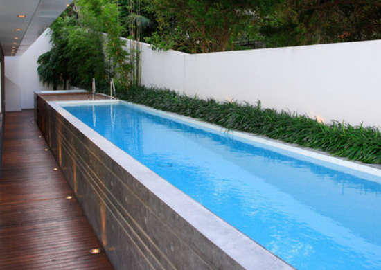 7.Concrete Lap Pool Sideview via Simphome.com