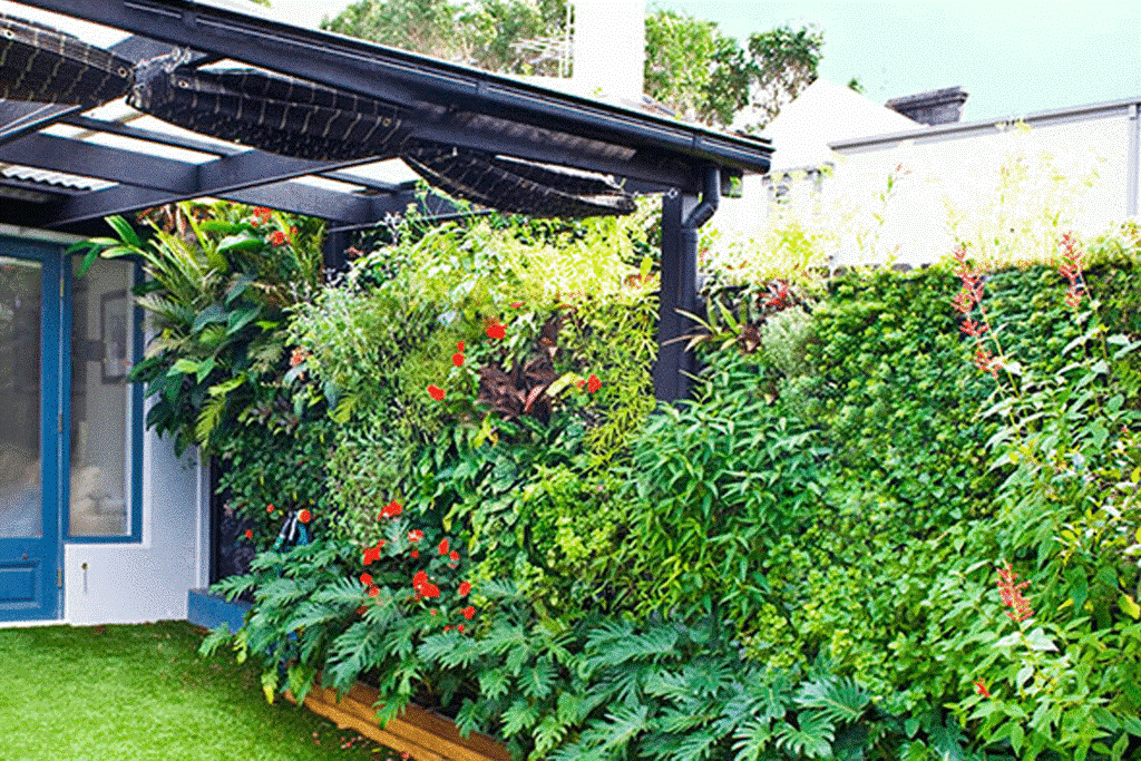 7.SIMPHOME.COM 10 Ideas how to make backyard privacy landscaping Add Variety with a Vertical Garden Bed
