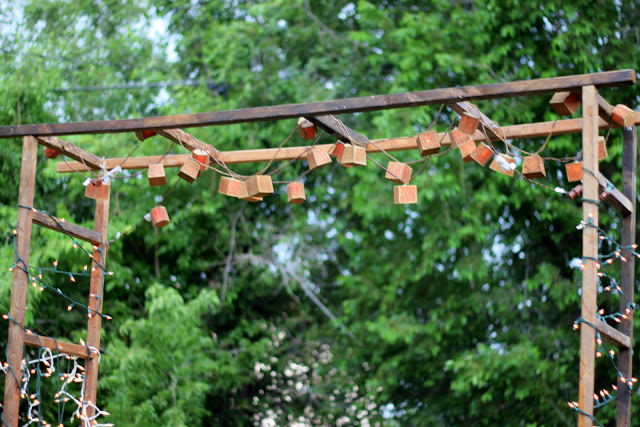2.Craft A Rustic Pergola in Backyard via Simphome.com