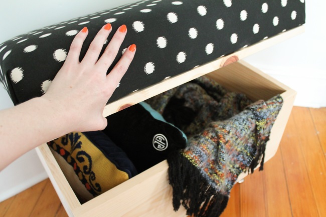 2.Try a wooden Ottoman with Storage via Simphome.com