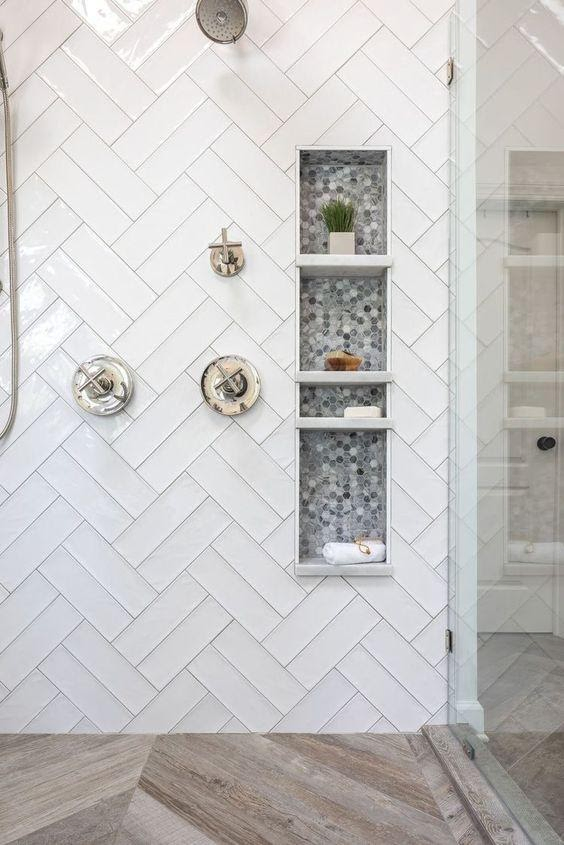 11. WHITE SUBWAY TILE PATTERN SHOWER by simphome.com