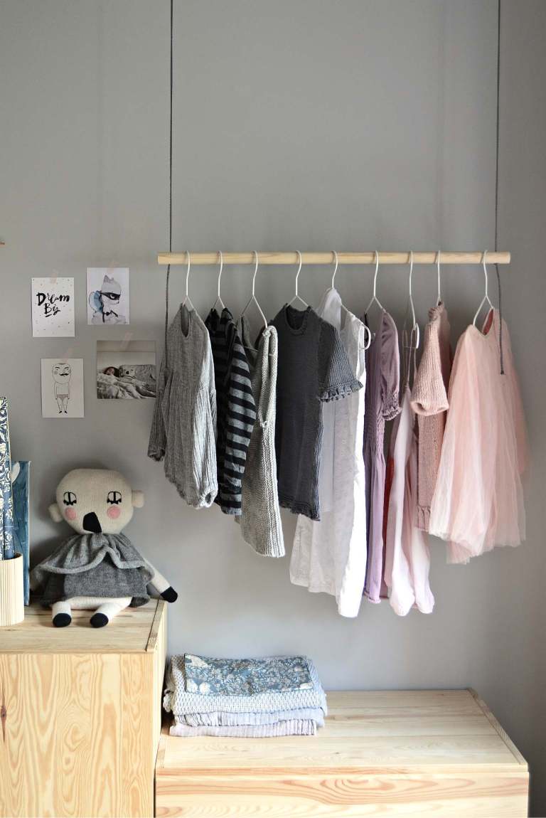 9. Hang On With This DIY Hanging Clothes Rack by simphome.com