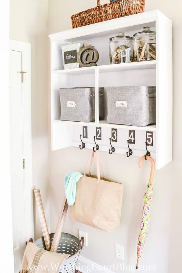 2. Turn An Old Hutch Into A Dropzone for a Mudroom by simphome.com