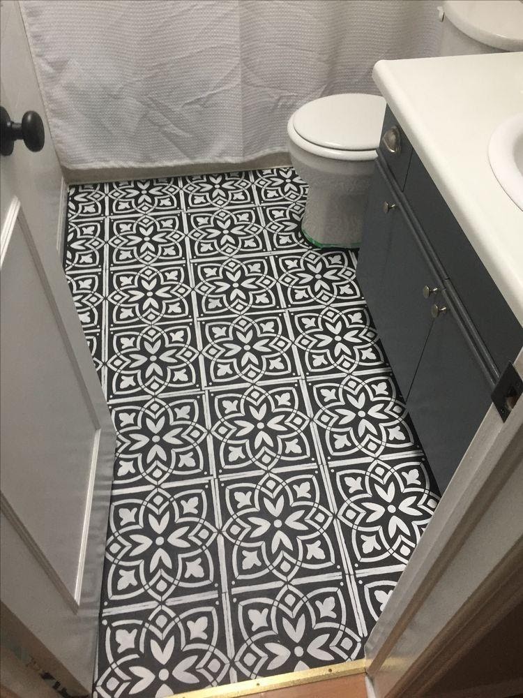 5. Stenciled Bathroom Floor by simphome.com