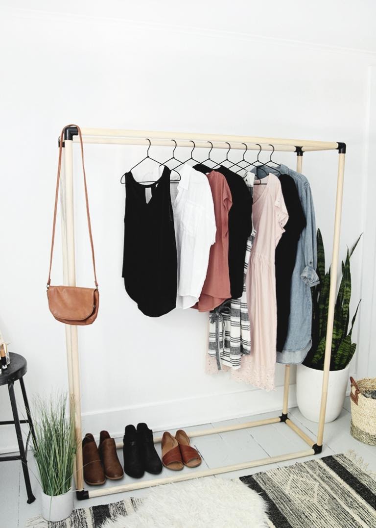 11. How to turn wooden dowels to an awesome open clothing rack easily by simphome.com .